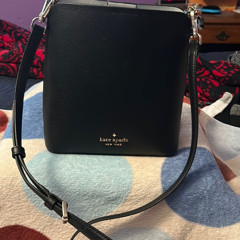 Kate spade small bucket purse with silver buckles